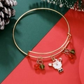 Macro detail of adjustable gold Christmas bangle with Santa Claus and festive beads - Alloy Santa (D1362)