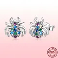 S925 Sterling Silber Spinnen-Ohrstecker mit bunten Zirkoniasteinen in symmetrischer Sicht - 925er Silber / Bunte Spinne