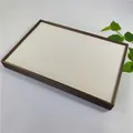 Detail view of large capacity ring display tray with 100 slots and velvet lining - Khaki + White Brushed Leather