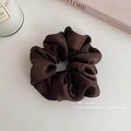 Detail of a dark brown satin scrunchie with silky pleats on a minimalist background - Medium 8cm / Dark Coffee