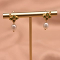 Golden earrings with green four-leaf clover crystal and white teardrop pearl drops - Emerald Leaf Studs