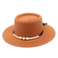 Dettaglio cappello di paglia intrecciato con nastro nero e decoro di perle bianche - Arancione