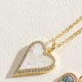 Golden heart necklace with white mother of pearl inlay and micro-pave zircons - White
