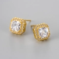 Macro detail of square zircon stud earrings with sparkling halo micro-pave setting - Gold White