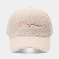 Close-up of beige sherpa fleece baseball cap with pink Mama embroidery and heart detail - Beige