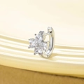 Silver clover hoop earring with heart-shaped clear zircons on a beige ceramic plate - White (Single Piece)