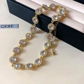 Collier vintage doré avec des diamants ronds étincelants et un fond de boîte à bijoux - Zirconia Blanc (Base Dorée)