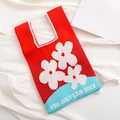 Knit tote bag with red and blue color block design and white floral pattern - Red-Flower