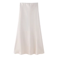 Detail shot of the glossy beige satin midi skirt showing smooth silk texture and drape - XS / White