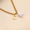 Elegant gold C letter necklace featuring a natural white baroque pearl on a fine chain - Letter C Necklace