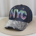 Close-up of denim baseball cap featuring colorful sequin NYC letters and rhinestone details - Style 45-Deep Blue Denim NYC Sequins