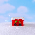 Miniature Christmas resin ornament in red with snow effect and holiday leaf details - No. 20 Train Carriage