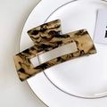 Square acrylic hair claw clip with brown amber tortoiseshell pattern on white plate - 10cm / Black