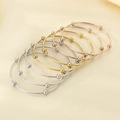 Bracciali rigidi minimalisti in oro, argento e oro rosa con accenti di perline in metallo - Diametro Interno 56mm / 7 Anelli / Multicolore