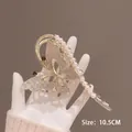 Pince à cheveux papillon dorée de 10,5 cm avec strass blancs et perles élégantes - Perle Papillon Strass