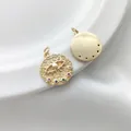 Detailed view of 14K gold plated evil eye charms with hammer texture and colorful gemstones - Color CZ Eye Round Pendant 16mm