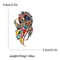 Spilla vintage in lega dorata con gemme multicolori e misure: 9,4 cm per 5,3 cm - Arcobaleno