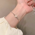 Elegant silver pearl bracelet featuring a camellia flower charm on a minimalist chain - S438 Silver