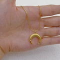 Golden crescent moon necklace with intricate scale texture and fine snake chain - Patterned Moon