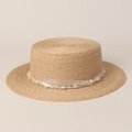 Close-up of natural raffia boater hat with elegant organza ribbon and pearl embellishments - M(56-58cm) / Beige