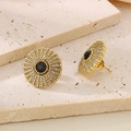 Macro detail of vintage gold stud earrings with a black stone and pave crystals - Gold Black (KE116354-KFC)