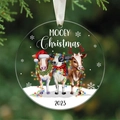 Round acrylic ornament with cows and MOOEY Christmas text for tree decoration - Three Cows Christmas 2023