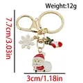 Golden Christmas keychain with Santa Claus and snowflake charms, weight 12g, size 7.7cm - ER1796-Santa Snowflake Sock 8-shape Keychain
