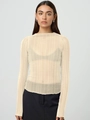 Detail of sheer apricot knit fabric with vertical ribbed texture on long sleeve top - Apricot
