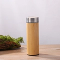 Eco-friendly bamboo vacuum flask with stainless steel lid on a rustic wooden table - 350ml Bamboo Shell Straight Cup