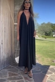 Detail of a black V-neck halter maxi dress featuring a flowing silhouette for beach vacations - S / Black