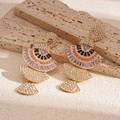 Detail of vintage tiered fan earrings with multi-colored crystals on a stone surface - Fan Shaped Earrings with 925 Silver Pin / Purple