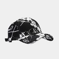 Detail view of cotton canvas baseball cap featuring white graffiti splatter and stitching - Trendy Black & White Graffiti Style (Color #7)