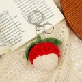 Cute red crochet fruit keychain with green leaves and metallic ring on lace decor - Lychee