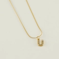 Elegant gold-plated stainless steel necklace featuring a crystal-encrusted 'U' letter pendant - Letter U