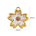 Macro detail of 14k gold plated white shell flower pendant measuring 14mm by 13mm - Pink Zirconia