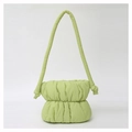 Close-up of light green puffer bucket bag featuring soft quilted texture and knotted strap - Light Green