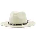 Close-up of finely woven cream straw Fedora hat with beaded leather trim and texture - Creamy White
