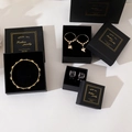Black Morandi jewelry box with gold stamping holding gold bracelets and earrings - 5*5*3cm With Sponge / Black