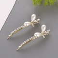 Eleganti fermagli dorati con perle a goccia e piccoli strass scintillanti per capelli - Stile Fiocco