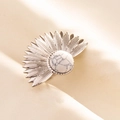 Macro shot of silver stainless steel ring with a marbled white stone setting on beige cloth - Silver White Style (J545-S-W)