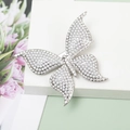 Sparkling butterfly hair clip with white pearls and rhinestones on a white stand - Pearl Rhinestone Style / Silver