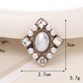 Macro shot of vintage pearl brooch with gold alloy base and crystals, 3cm x 2.7cm size - D1729 Rhombus Gemstone
