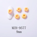 Detail of 9mm pink and yellow donut nail art charms with model MZH-9577 on white background - Yellow and Pink Donut MZH-9577