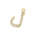Detailed macro view of a gold-plated letter J pendant inlaid with sparkling cubic zirconia - Gold 05