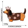 Embroidered dachshund patch with pink crown and floral dress, size 5.5cm by 3.9cm - Dachshund with Crown and Pink Floral Shirt