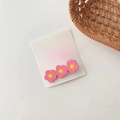 Sweet pink floral hair clips set of six pieces displayed on a white paper card - Pink Triple Flower Set