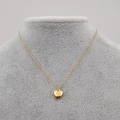 Collana minimalista in acciaio al titanio dorato con un piccolo ciondolo a cuore - Stile Cuore