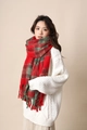 Winter scarf featuring classic red and green plaid pattern with soft tassel details - Christmas Boucle Red & Green Plaid / Red