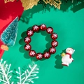 Bracciale natalizio con perle in resina rossa e motivi a fiocchi di neve bianchi - Rosso / Stampa Fiocco di Neve