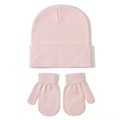 Close-up of pink knitted baby beanie and matching mittens set for winter warmth - Pink
